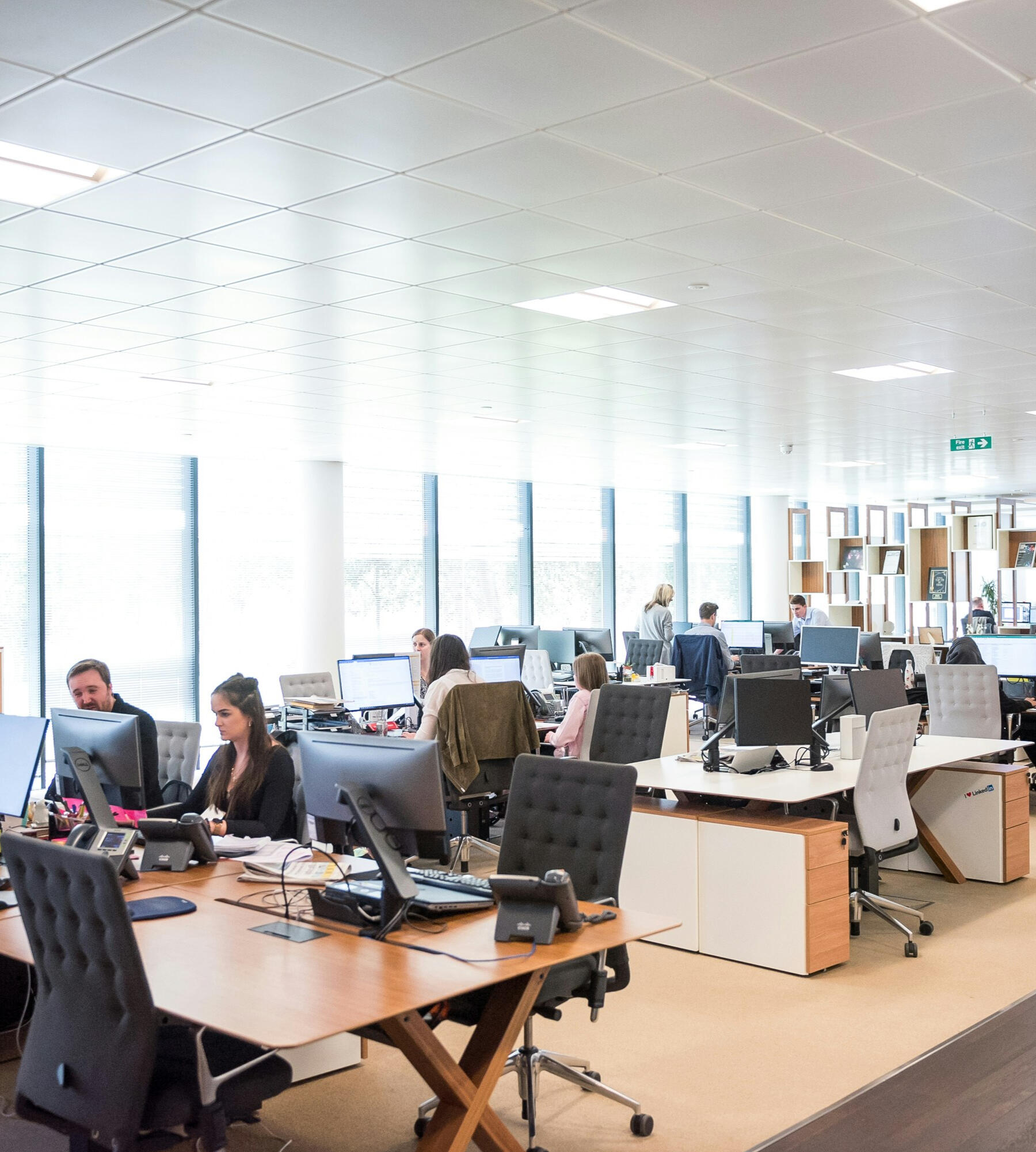 offshore-staffing-team-collaboration.jpg Offshore staffing team collaborating in a professional office setting.